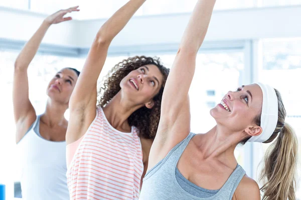 Sporty woman with arm raised — Stock Photo, Image