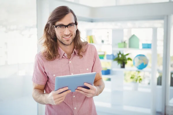 Portrait of confident hipster holding digital tablet — Stock Photo, Image