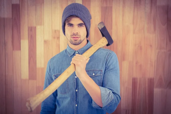 Portrait of confident hipster holding axe on shoulder — Stock Photo, Image