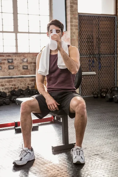 Man drinking from shaker bottle — Stock Photo, Image