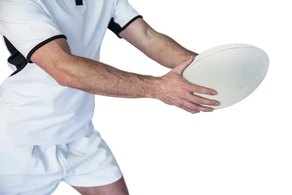 Sección media del jugador de rugby sosteniendo la pelota —  Fotos de Stock