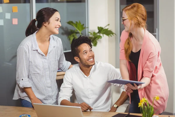 Happy business people at desk — Stock Photo, Image