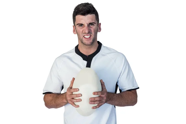 Retrato de un jugador de rugby enojado sosteniendo la pelota —  Fotos de Stock