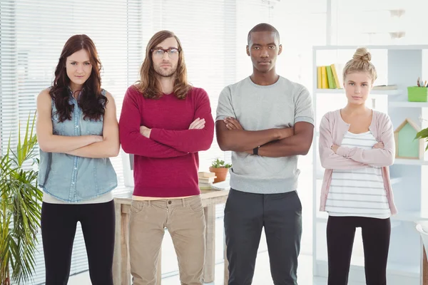 Portrait of business team with arms crossed — Stock Photo, Image