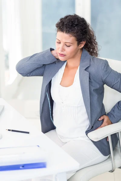 Tired pregnant businesswoman — Stock Photo, Image