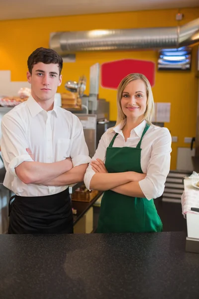 Confident coworkers in bakery — Stock Photo, Image