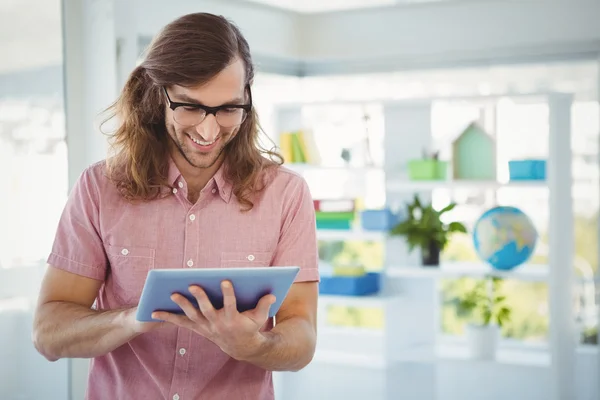 Happy hipster using digital tablet — Stock Photo, Image