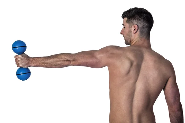 Muž protahovací paže současně držet činka — Stock fotografie