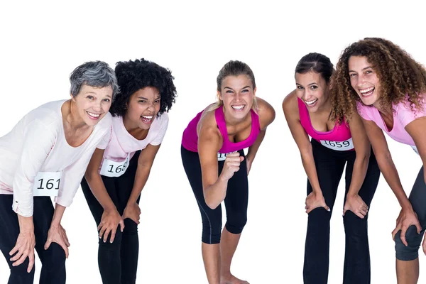 Portrait of happy athletes bending — Stock Photo, Image