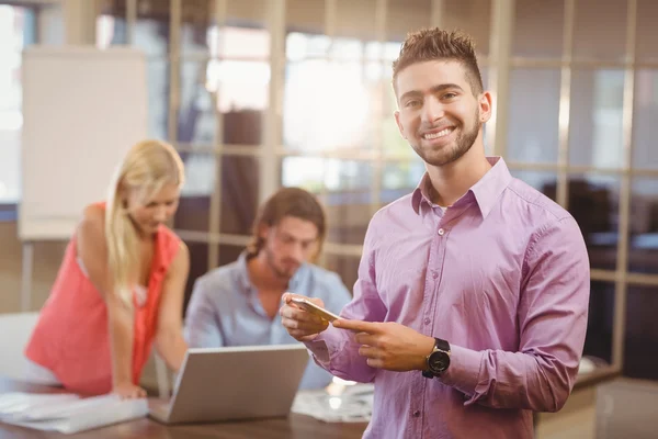 Portrait of businessman using on phone — Stock Photo, Image