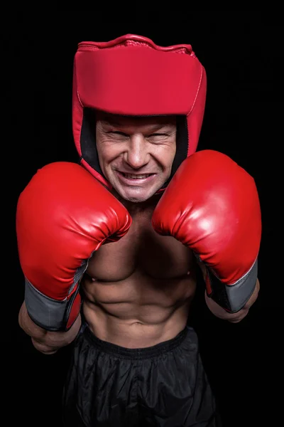Angry boxer with gloves and headgear — Stock Photo, Image