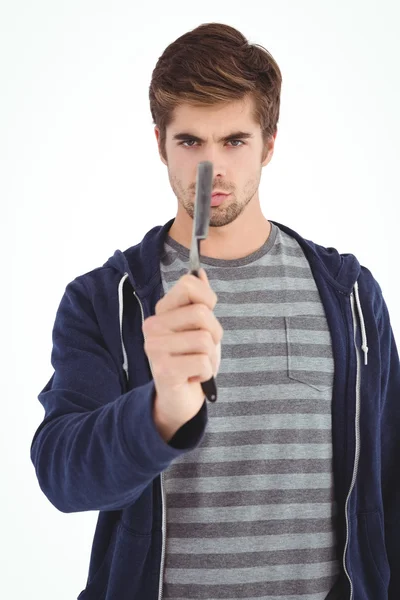 Portrait of man holding straight edge razor — Stock Photo, Image