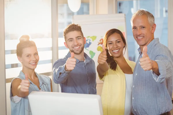 Business people showing thumbs — Stock Photo, Image