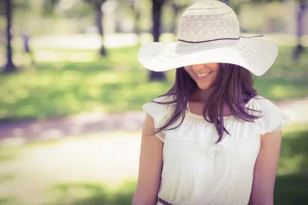 Smiling young woman in sun hat — Stock Photo, Image