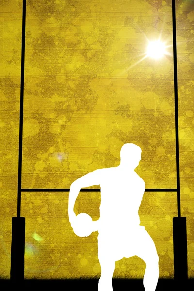 Composite image of silhouette of rugby player — Stock Photo, Image