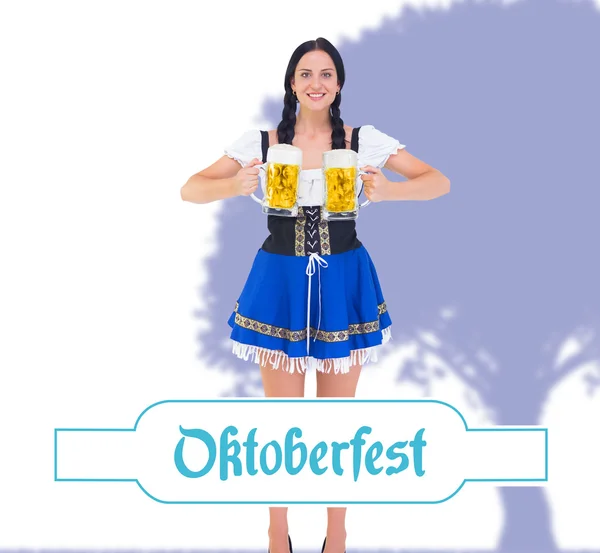 Oktoberfest girl holding beer tankards — Stock Photo, Image