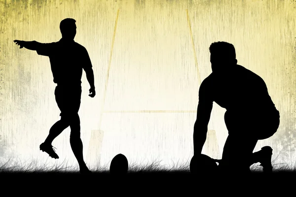 Silhouetten van rugbyspelers — Stockfoto