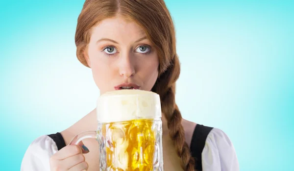 Oktoberfest girl drinking jug of beer — Stock Photo, Image