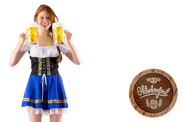 Oktoberfest meisje houden kannen bier — Stockfoto