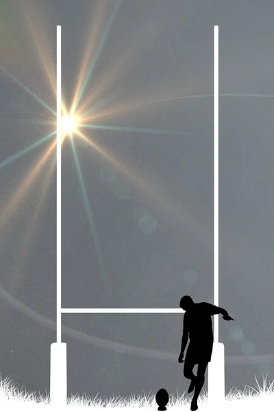 Samengestelde afbeelding van silhouet van rugbyspeler — Stockfoto
