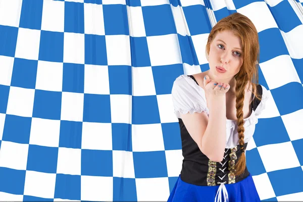 Oktoberfest girl blowing a kiss — Stock Photo, Image