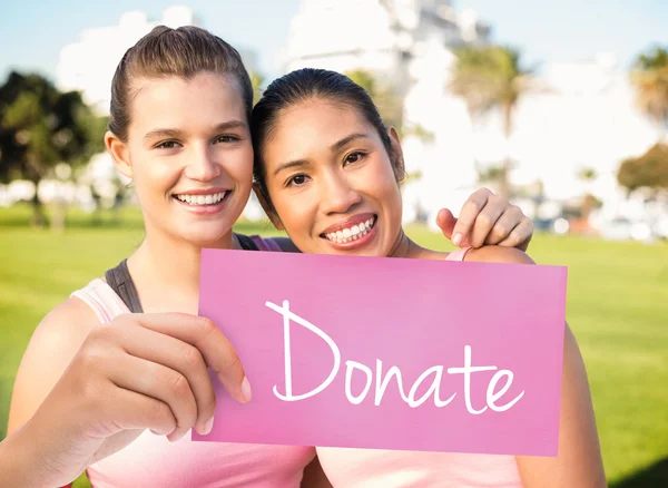 Donate against two smiling women — Stock Photo, Image