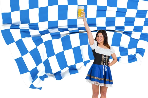 Oktoberfest girl raising beer tankard — Stock Photo, Image