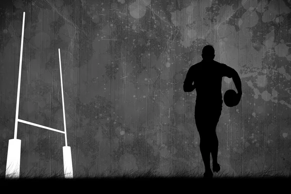 Silhouet van rugbyspeler — Stockfoto