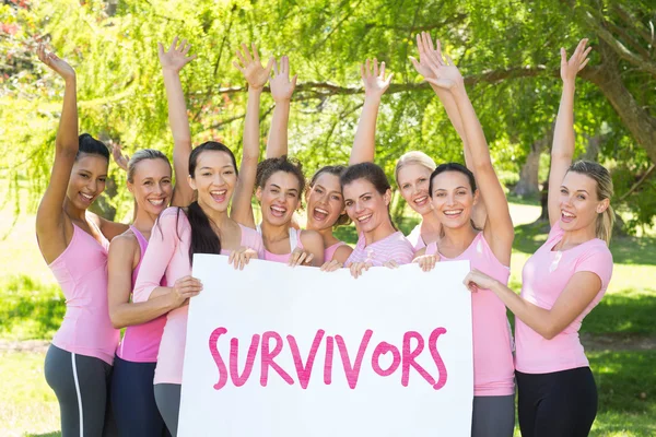 Composite image of survivors in pink — Stock Photo, Image