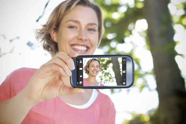 Hand holding smartphone — Stock Photo, Image