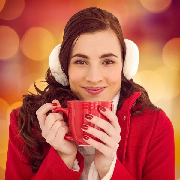 Woman in winter clothes enjoying a hot drink — Stock Photo, Image