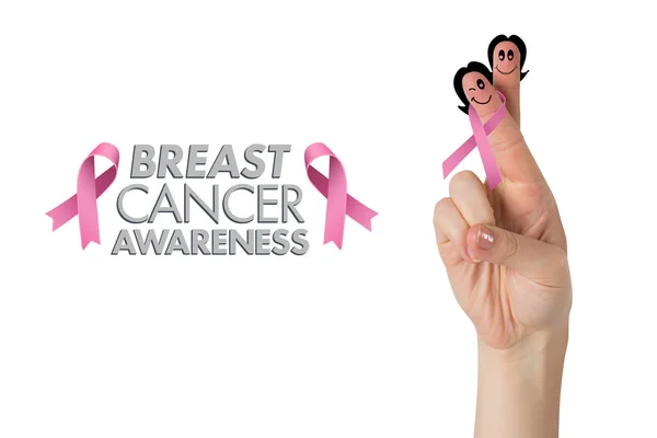Crossed fingers with breast cancer ribbon — Stock Photo, Image