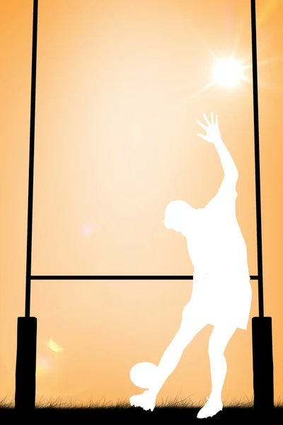 Composite image of silhouette of rugby player — Stock Photo, Image