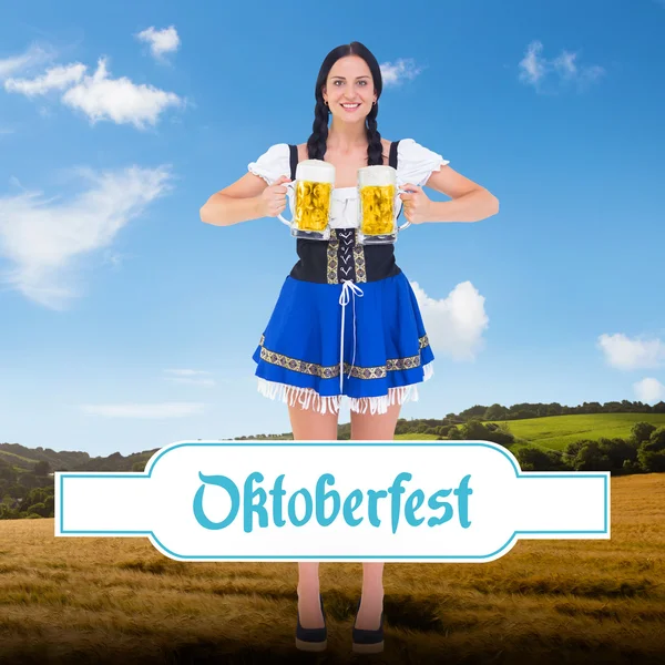 Oktoberfest girl drinking jug of beer — Stock Photo, Image