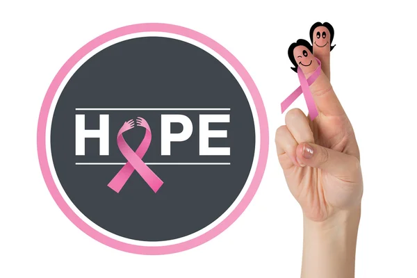 Crossed fingers with breast cancer ribbon — Stock Photo, Image