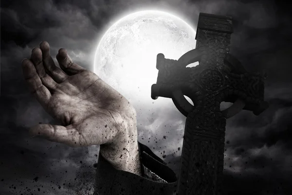 Zombie hand bursting from the grave — Stock Photo, Image
