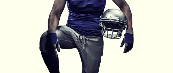 Samengestelde afbeelding van mid sectie van sportman houden helm — Stockfoto