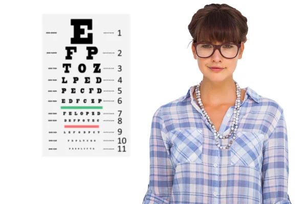 Mujer bonita en gafas contra la prueba ocular — Foto de Stock