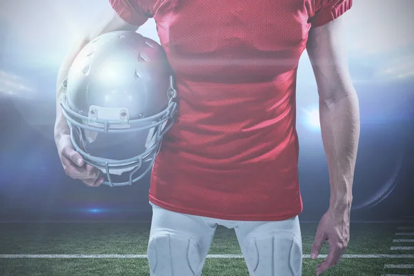 American football player holding helmet — Stock Photo, Image