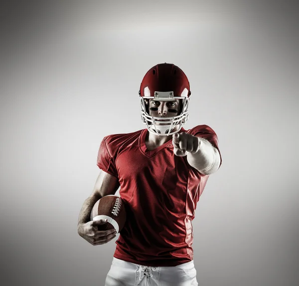 American football player pointing at camera — Stock Photo, Image