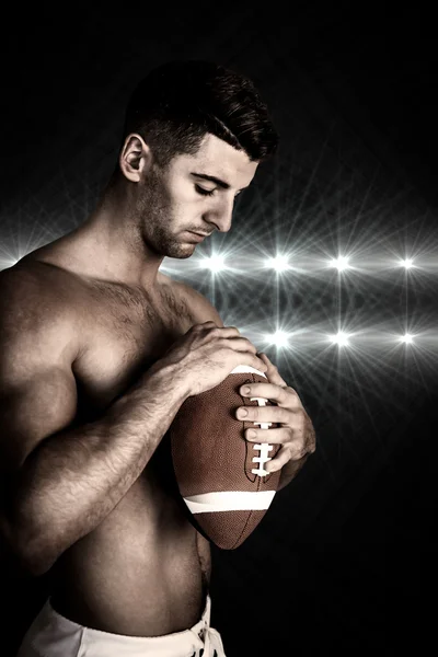 Shirtless rugby player holding the ball — Stock Photo, Image