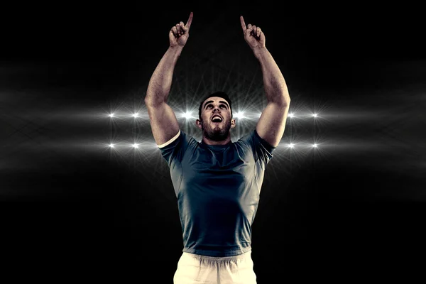 Rugby player cheering and pointing — Stock Photo, Image