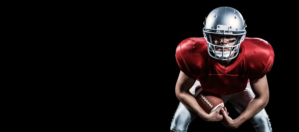 Jogador de futebol americano flexão — Fotografia de Stock