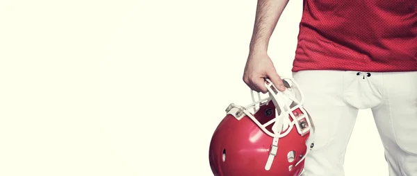 Amerikaans voetbal speler bezit is van een helm — Stockfoto
