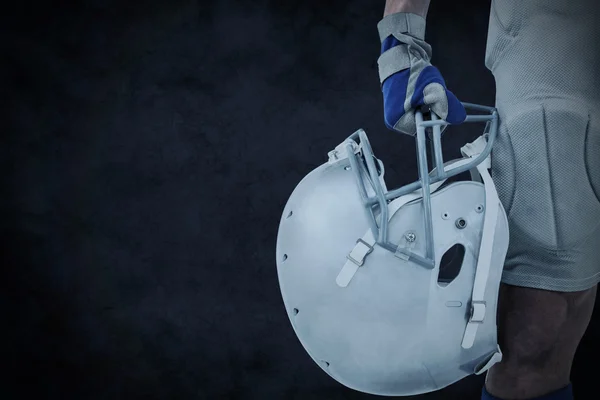 American football player holding helmet — Stock Photo, Image