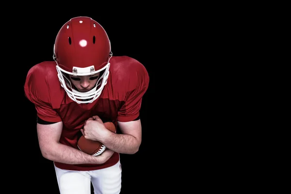 Joueur de football américain courir avec le ballon — Photo