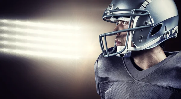 Sportsman with helmet looking away — Stock Photo, Image