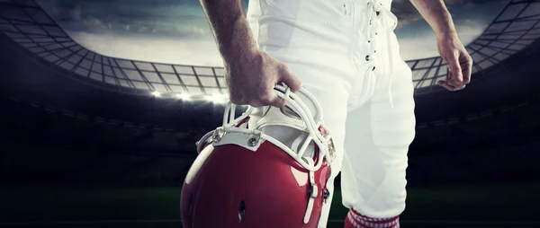 American football player holding his helmet — Stock Photo, Image