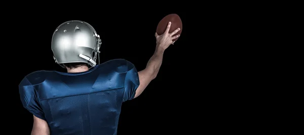 Jugador de deportes celebración de pelota — Foto de Stock