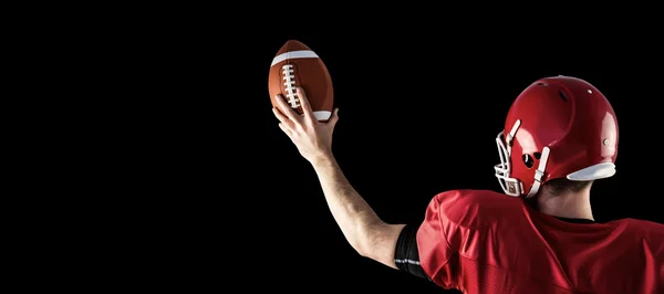 Jogador de futebol americano segurando futebol — Fotografia de Stock